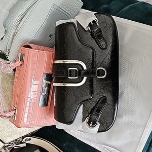 New black and silver clutch